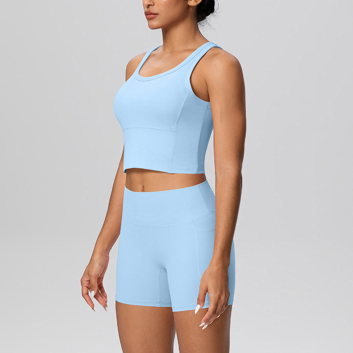 Solid Color Skin Friendly Back Shaping Padded Sports Vest Pocket Yoga Pants Shorts Fitness Yoga Wear Set for Women